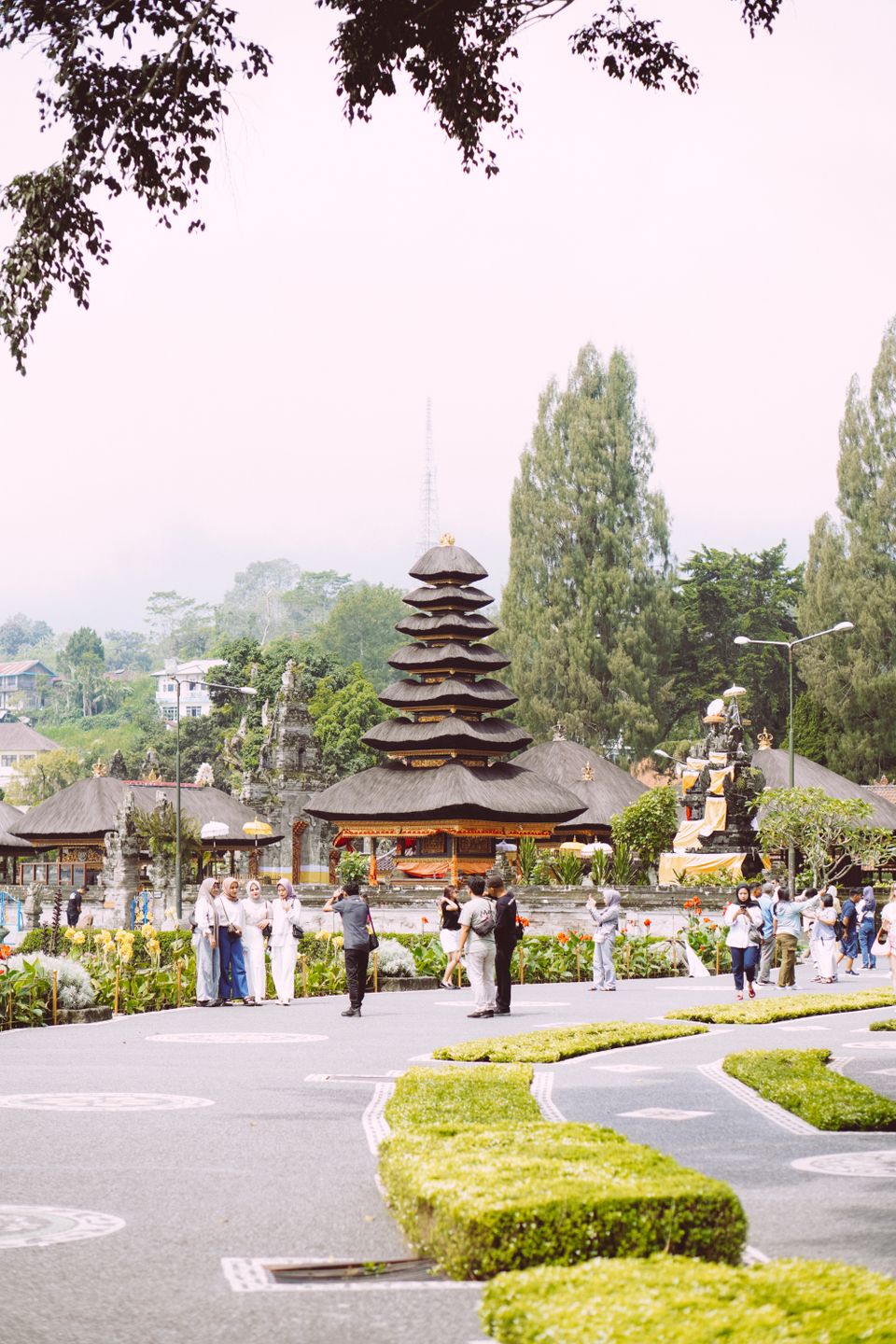 Traditional Balinese temple surrounded by lush greenery
